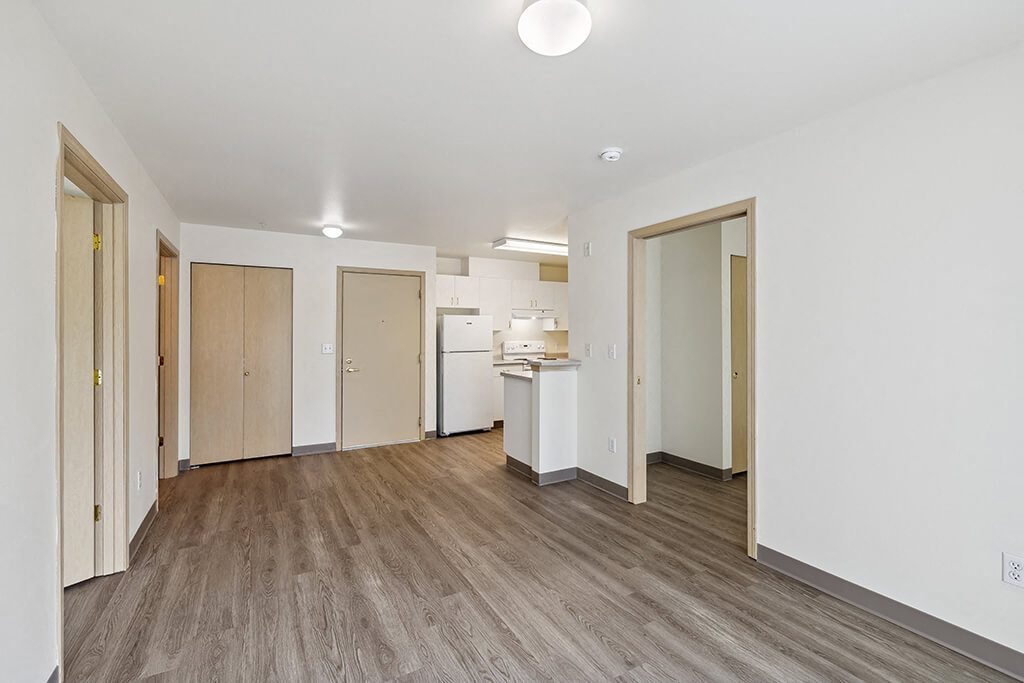Living room and kitchen at Ballinger Court Senior Apartments in Edmonds WA
